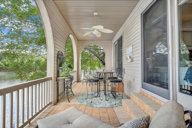 view of patio / terrace featuring entry steps and ceiling fan
