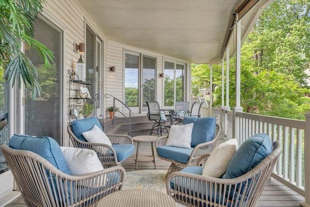 sunroom / solarium featuring a healthy amount of sunlight
