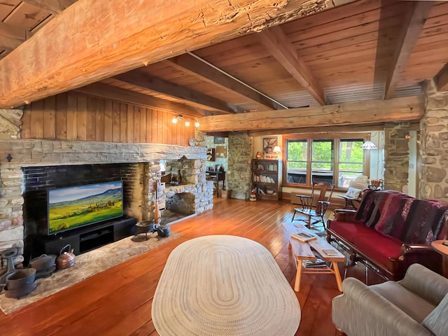 388 Hemlock Ridge Ln, Catawba, VA 24070 - living room with a fireplace, hardwood / wood-style flooring, beam ceiling, and wood ceiling