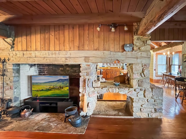 388 Hemlock Ridge Ln, Catawba, VA 24070 - living area featuring wood ceiling, hardwood / wood-style flooring, beam ceiling, wooden walls, and a chandelier