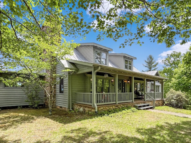 388 Hemlock Ridge Ln, Catawba, VA 24070 - view of front of house featuring covered porch and a front lawn