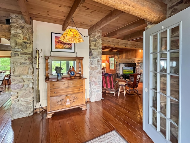 388 Hemlock Ridge Ln, Catawba, VA 24070 - interior space with wood finished floors, wooden ceiling, beam ceiling, and a fireplace