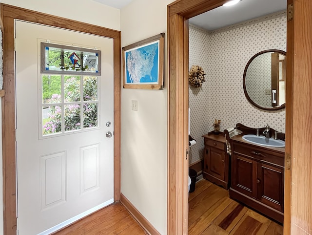 388 Hemlock Ridge Ln, Catawba, VA 24070 - entryway featuring light wood finished floors, a sink, and baseboards