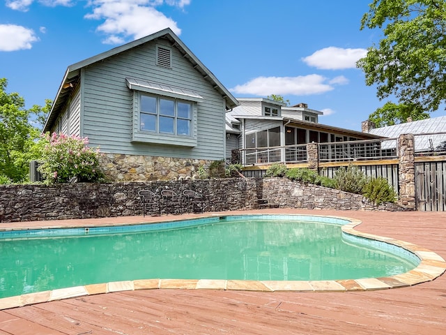 388 Hemlock Ridge Ln, Catawba, VA 24070 - view of swimming pool with a deck and a sunroom