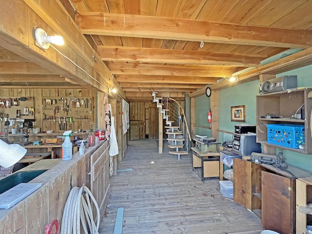 388 Hemlock Ridge Ln, Catawba, VA 24070 - below grade area featuring wood ceiling, wood finished floors, and stairway