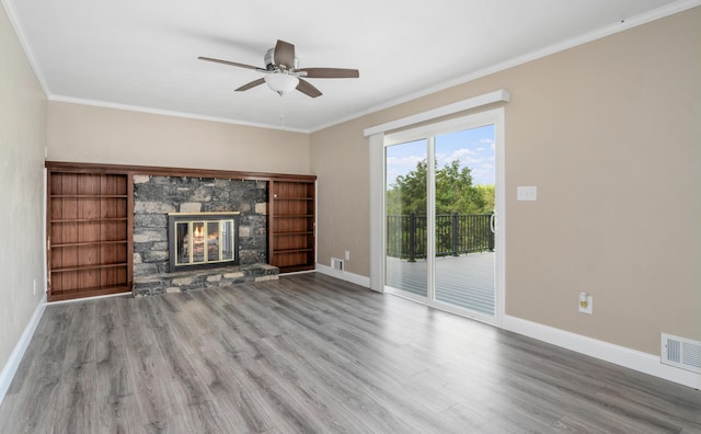unfurnished living room with wood finished floors, baseboards, and ceiling fan