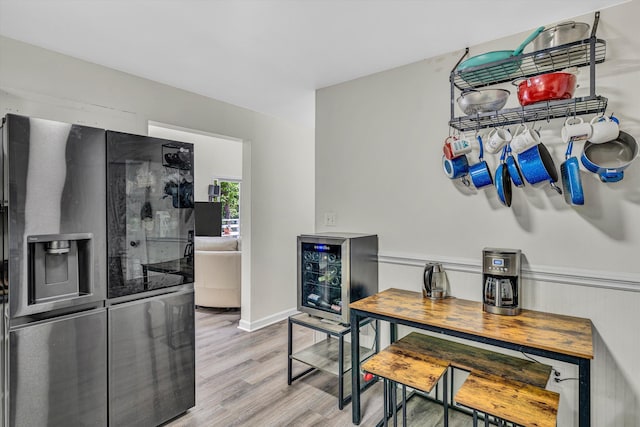 1393 Deepwoods Rd, Hardy, VA 24101 - dining space featuring wood finished floors, beverage cooler, and baseboards