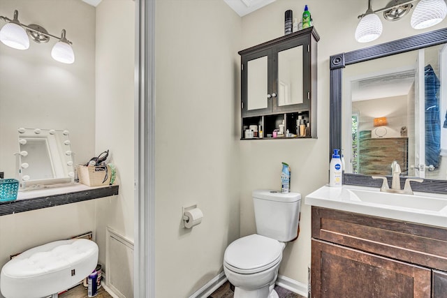 1393 Deepwoods Rd, Hardy, VA 24101 - bathroom featuring toilet, vanity, and baseboards