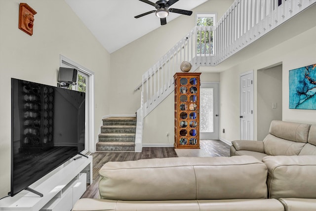 1393 Deepwoods Rd, Hardy, VA 24101 - living area featuring high vaulted ceiling, wood finished floors, stairs, ceiling fan, and baseboards