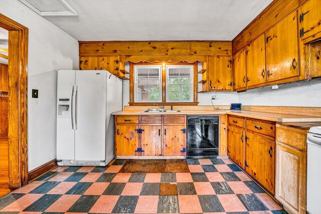 7080 Oak Level Rd, Bassett, VA 24055 - kitchen featuring dark floors, a sink, white refrigerator with ice dispenser, and dishwasher