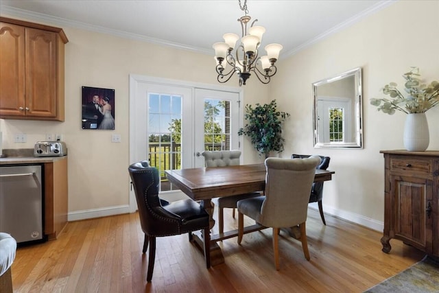 330 Sheliah Ct, Blacksburg, VA 24060 - dining room featuring a chandelier, light wood-style flooring, a wealth of natural light, and baseboards