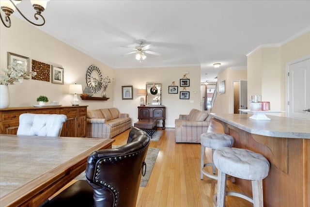 330 Sheliah Ct, Blacksburg, VA 24060 - living room featuring a ceiling fan, ornamental molding, and light wood-type flooring
