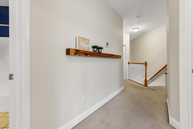 330 Sheliah Ct, Blacksburg, VA 24060 - corridor with baseboards, carpet flooring, and an upstairs landing