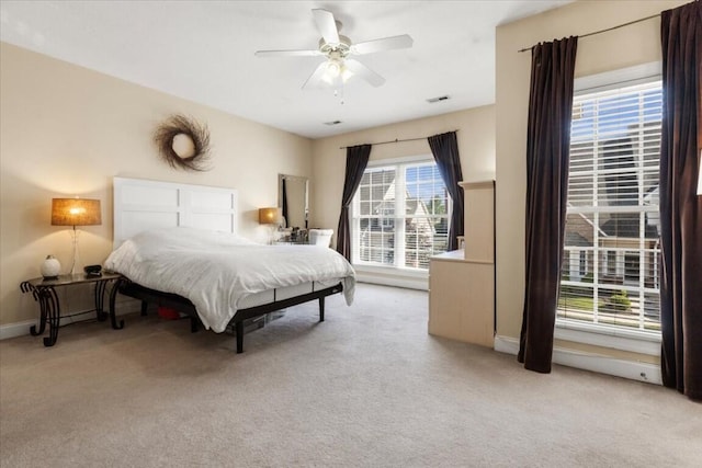 330 Sheliah Ct, Blacksburg, VA 24060 - bedroom featuring baseboards, light carpet, and ceiling fan