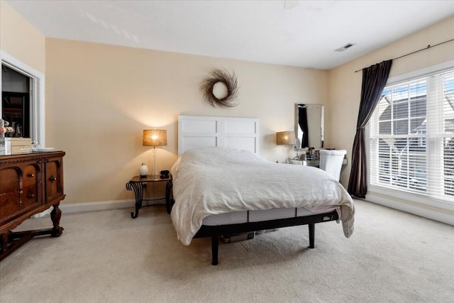 330 Sheliah Ct, Blacksburg, VA 24060 - bedroom featuring light carpet, baseboards, and visible vents
