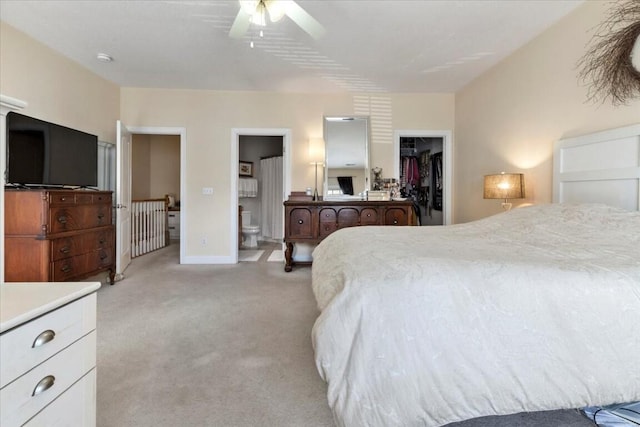 330 Sheliah Ct, Blacksburg, VA 24060 - bedroom with a closet, ensuite bathroom, light colored carpet, a ceiling fan, and a walk in closet