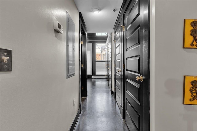 corridor featuring concrete flooring