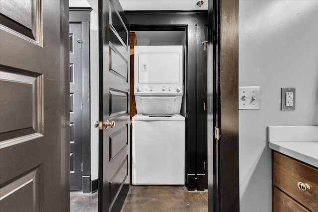 laundry area with laundry area and stacked washing maching and dryer