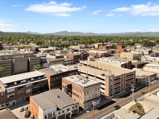 property's view of city with a mountain view