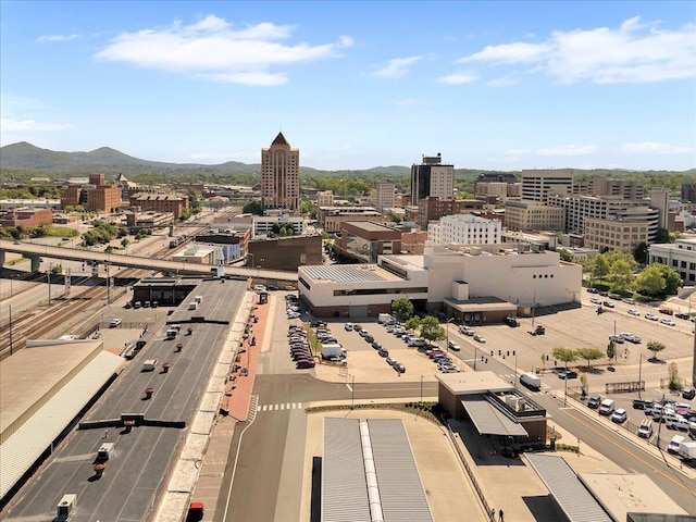 bird's eye view featuring a city view and a mountain view