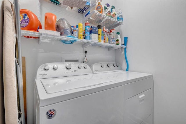 washroom with laundry area and washer and clothes dryer