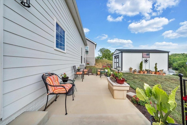 view of patio / terrace with an outdoor structure