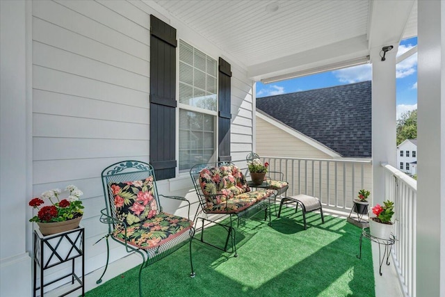 balcony featuring a porch