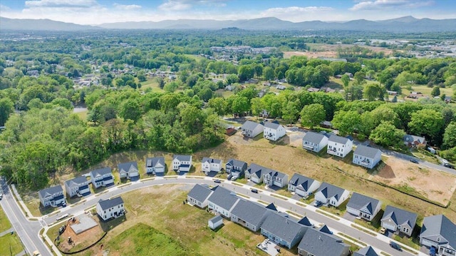 drone / aerial view featuring a mountain view and a residential view
