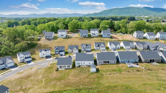 birds eye view of property featuring a residential view and a mountain view