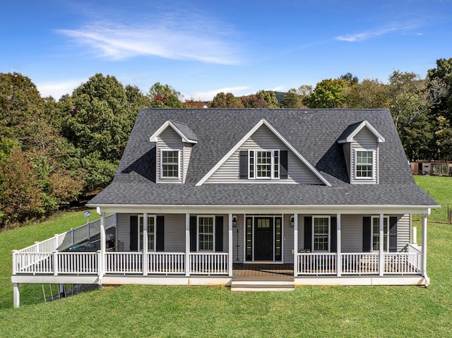 1169 Mountain Creek Ln, Big Island, VA 24526 - farmhouse-style home with a porch, a front lawn, and a shingled roof