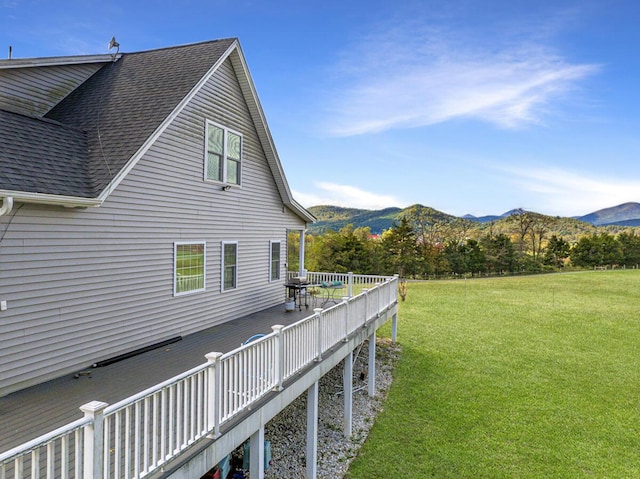 1169 Mountain Creek Ln, Big Island, VA 24526 - view of side of home featuring a yard, a deck with mountain view, and a shingled roof