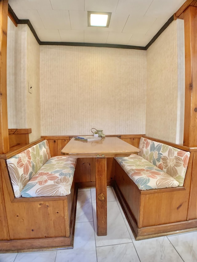 sitting room featuring ornamental molding