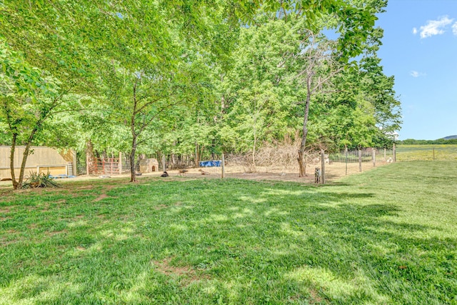 view of yard with fence
