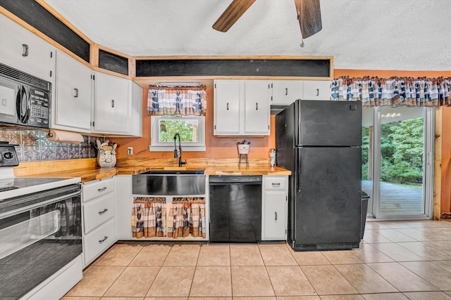 kitchen featuring white cabinets, ceiling fan, a sink, a textured ceiling, and black appliances