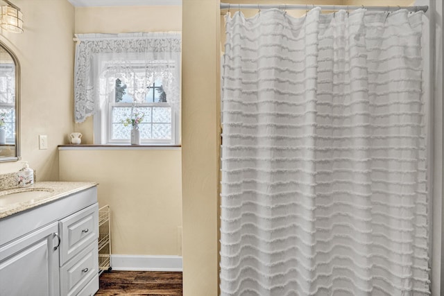 80 Farmers Cir, Moneta, VA 24121 - bathroom with vanity, wood finished floors, and baseboards