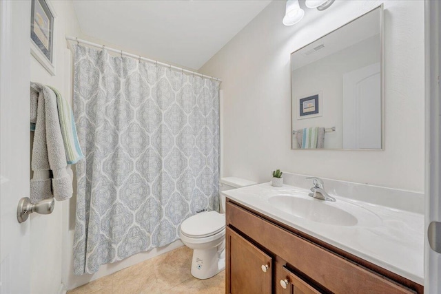 full bathroom featuring toilet, tile patterned floors, vanity, and curtained shower