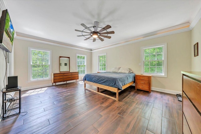 bedroom with crown molding, dark wood-style flooring, and multiple windows