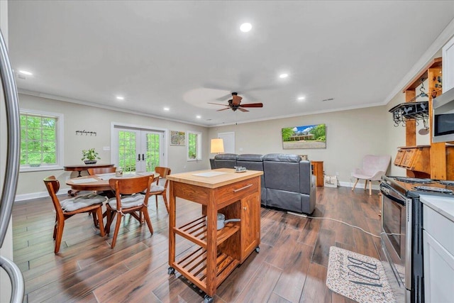 living area with crown molding, dark wood-style flooring, baseboards, recessed lighting, and french doors