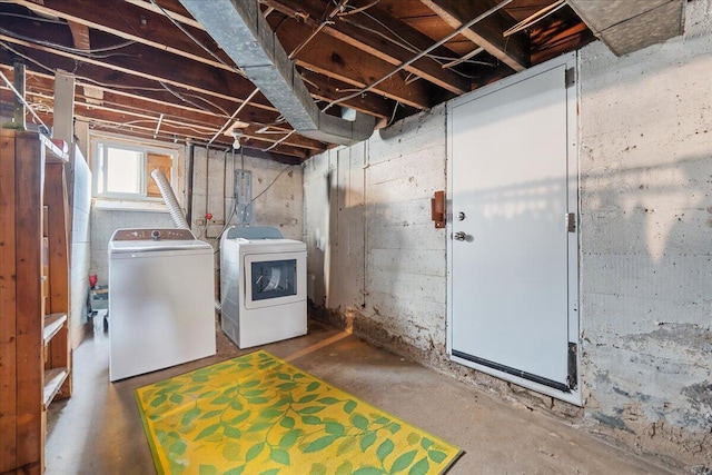 basement with washer and clothes dryer