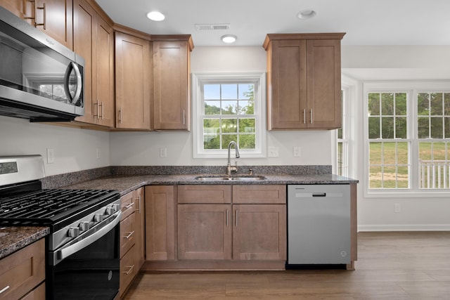5595 New Pleasant Way, Salem, VA 24153 - kitchen featuring recessed lighting, visible vents, a sink, light wood-style floors, and stainless steel appliances