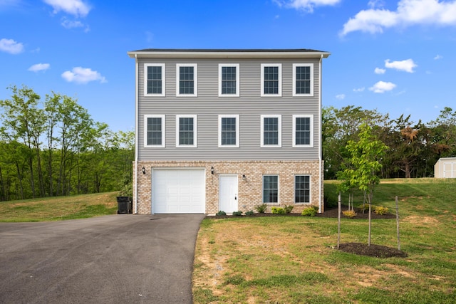 5595 New Pleasant Way, Salem, VA 24153 - view of front facade with aphalt driveway, an attached garage, a front lawn, and brick siding
