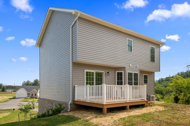 5595 New Pleasant Way, Salem, VA 24153 - rear view of property featuring cooling unit, a deck, and a lawn
