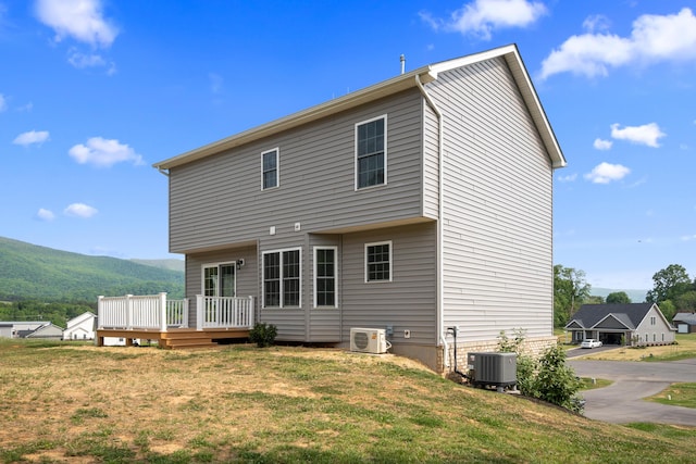 5595 New Pleasant Way, Salem, VA 24153 - rear view of house featuring a yard, a deck with mountain view, and ac unit