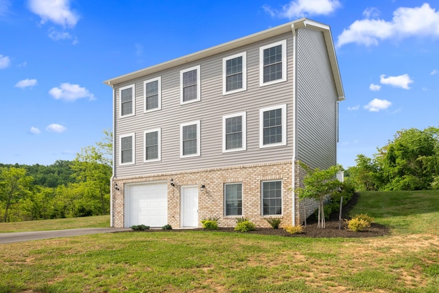 5595 New Pleasant Way, Salem, VA 24153 - view of front of house featuring an attached garage, brick siding, driveway, and a front yard
