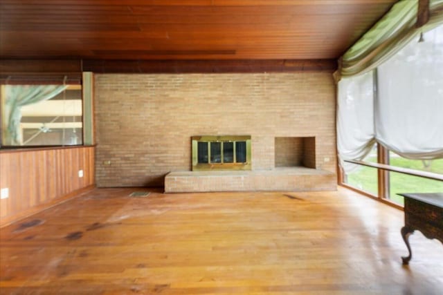 unfurnished sunroom featuring a wealth of natural light