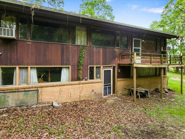 back of property with brick siding