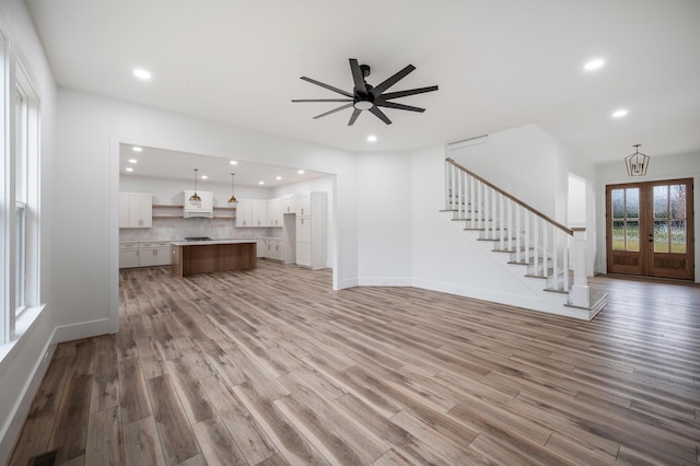 1065 Cedar Fox Ct, Forest, VA 24551 - unfurnished living room with a ceiling fan, stairway, recessed lighting, and wood finished floors