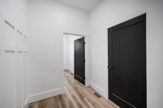 1065 Cedar Fox Ct, Forest, VA 24551 - corridor with baseboards, light wood-style floors, and visible vents