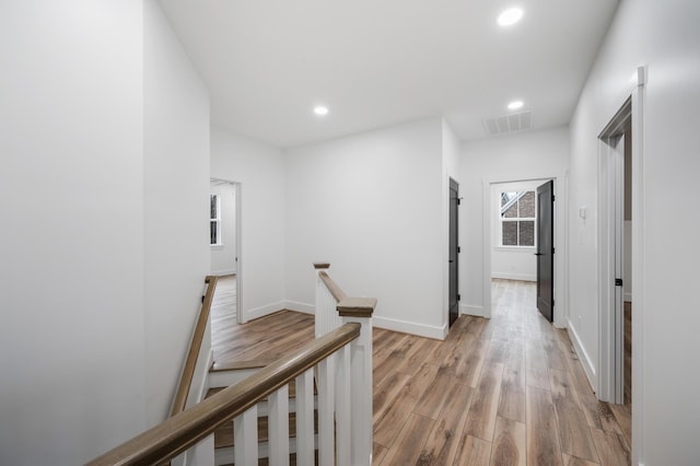 1065 Cedar Fox Ct, Forest, VA 24551 - hall featuring light wood-style floors, visible vents, an upstairs landing, and recessed lighting