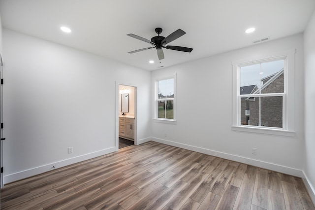 1065 Cedar Fox Ct, Forest, VA 24551 - unfurnished room with ceiling fan, baseboards, visible vents, and wood finished floors